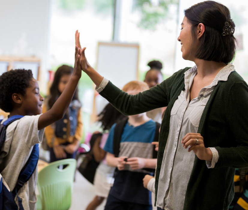 Image of teacher with students